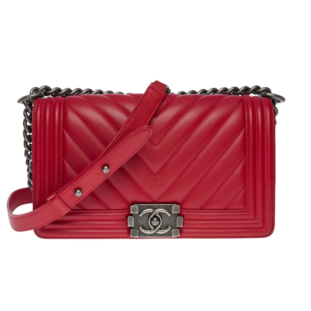 Chanel Boy Old Medium shoulder bag in red quilted herringbone leather, SHW