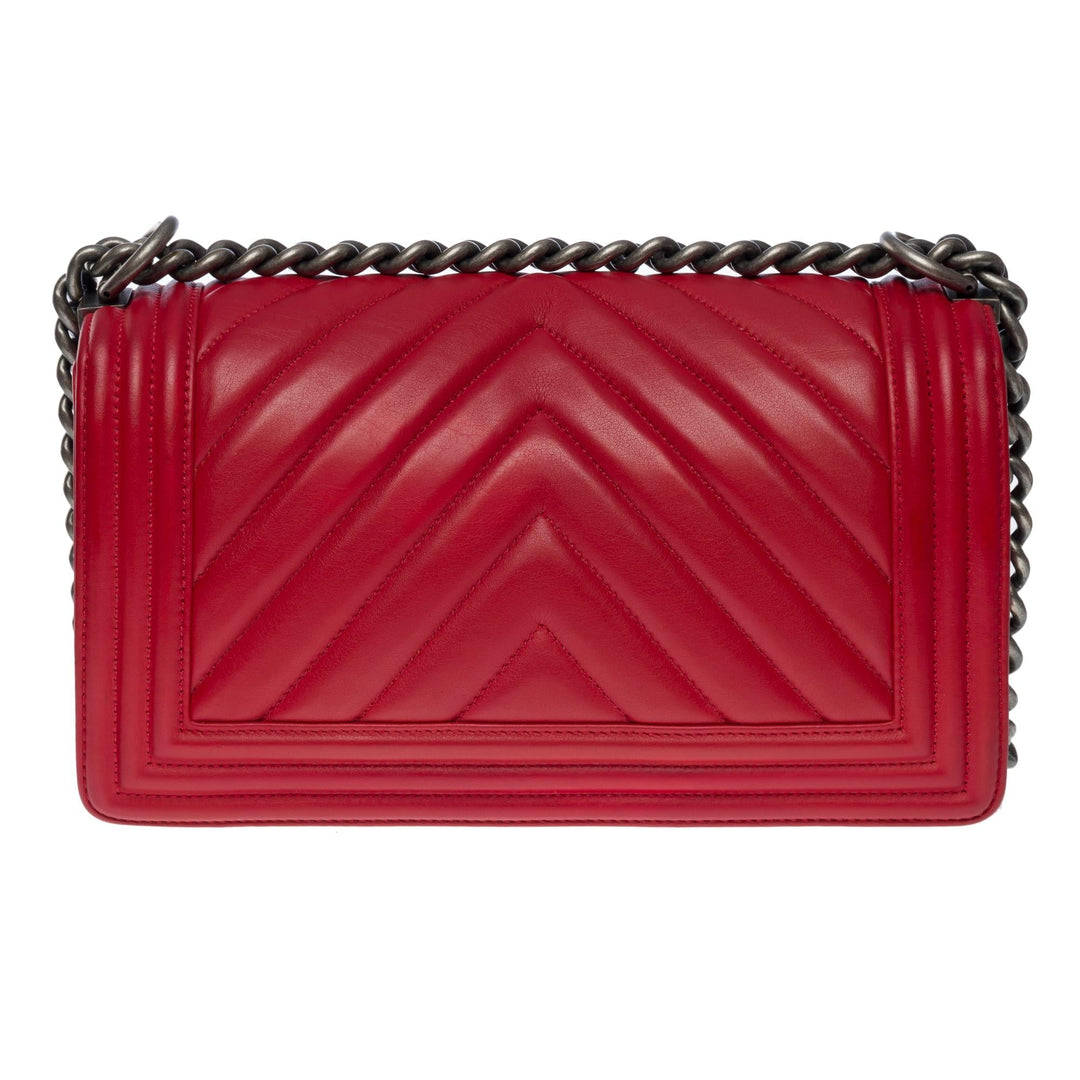 Chanel Boy Old Medium shoulder bag in red quilted herringbone leather, SHW