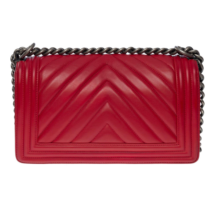 Chanel Boy Old Medium shoulder bag in red quilted herringbone leather, SHW