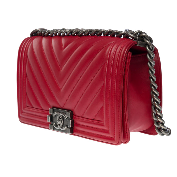 Chanel Boy Old Medium shoulder bag in red quilted herringbone leather, SHW