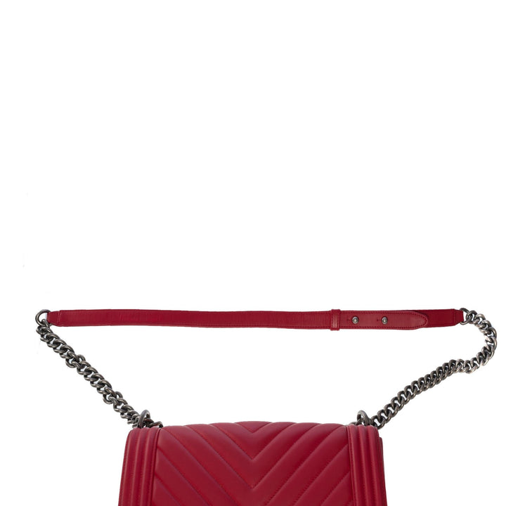 Chanel Boy Old Medium shoulder bag in red quilted herringbone leather, SHW