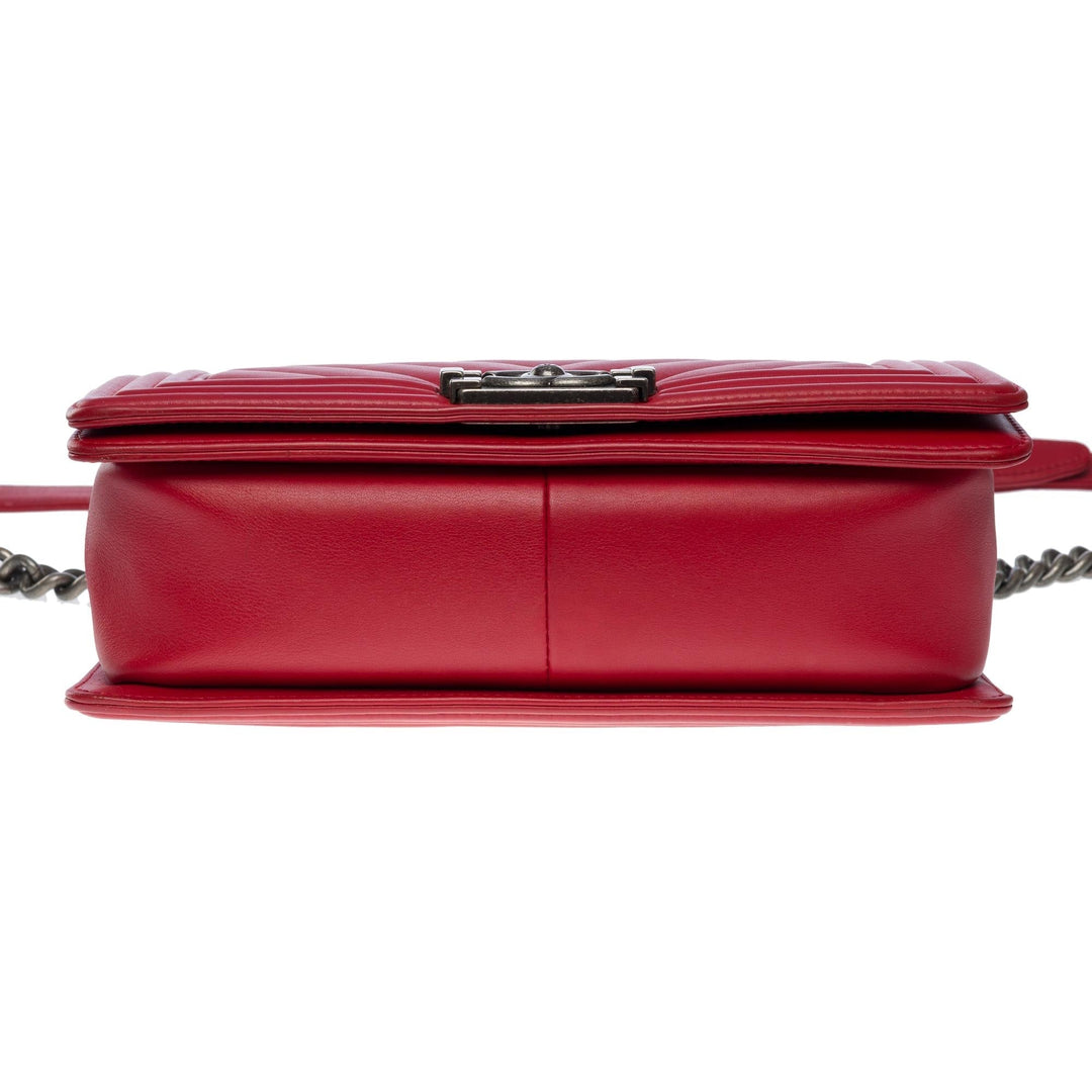 Chanel Boy Old Medium shoulder bag in red quilted herringbone leather, SHW