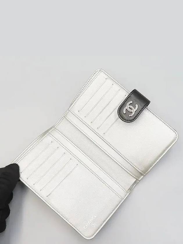 A50087 Black Lambskin Camellia Embossed Zip up Medium Wallet Chanel