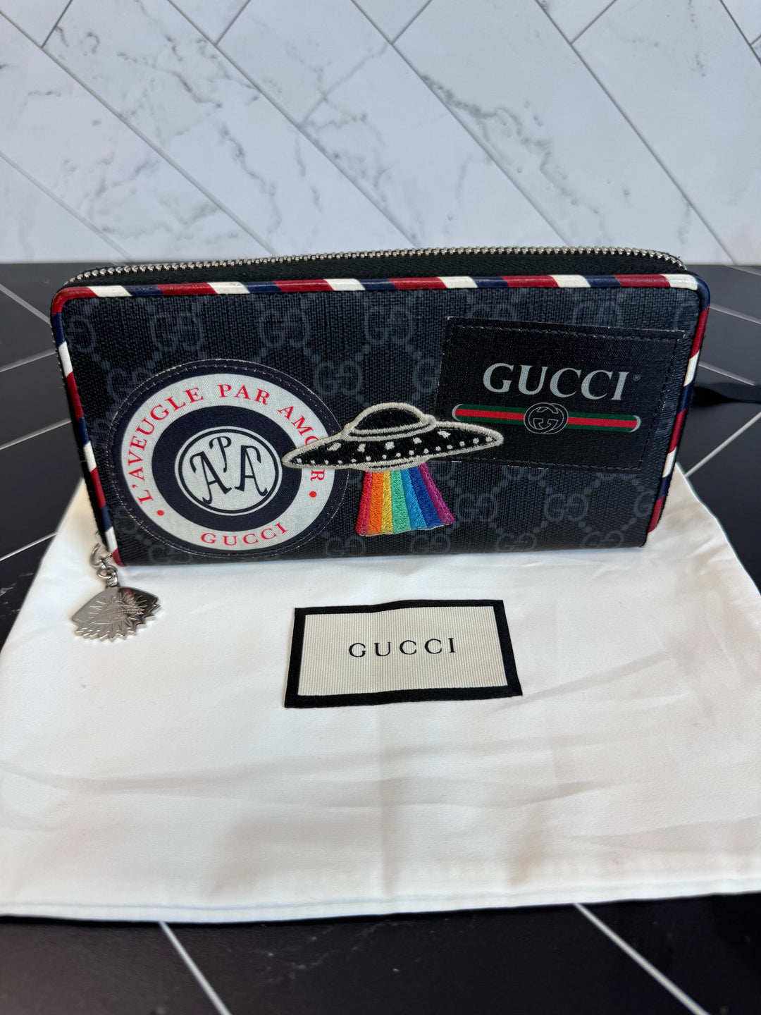 Gucci Canvas Courier Zippy Wallet