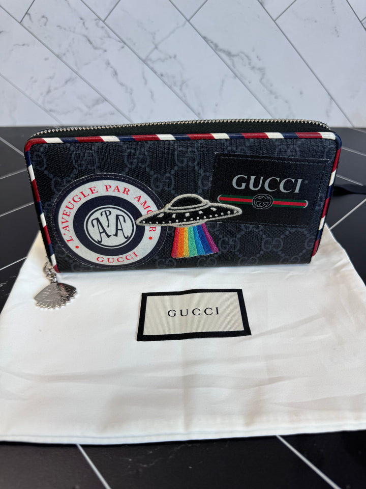 Gucci Canvas Courier Zippy Wallet