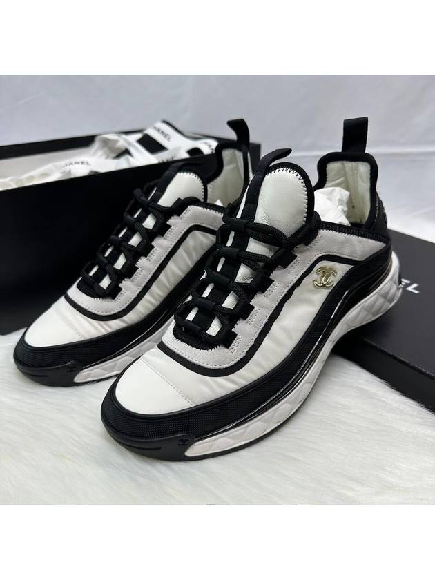 CC Logo Mixed Fiber Low Top Sneakers Black White Chanel