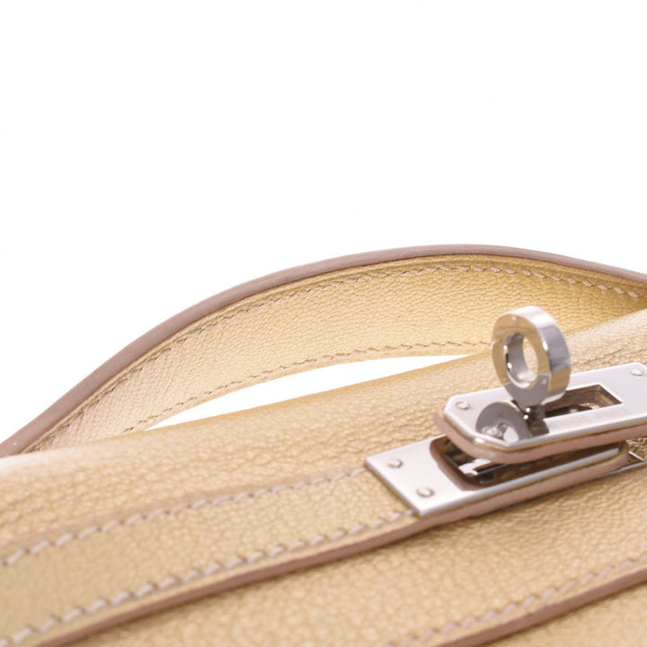 Top quality Hermes Pochette Kelly Metallic Gold  I Engraved (around 2005) Ladies Goat Chevre Handbag