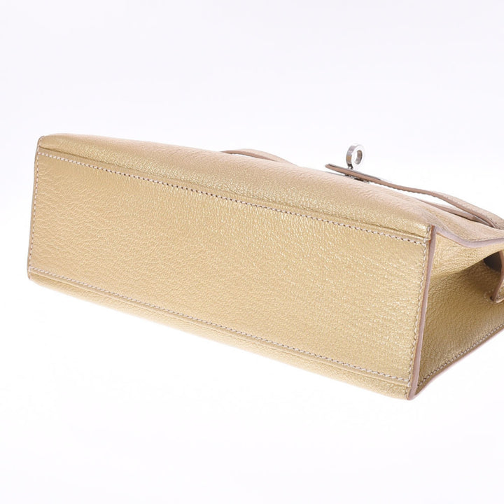 Top quality Hermes Pochette Kelly Metallic Gold  I Engraved (around 2005) Ladies Goat Chevre Handbag