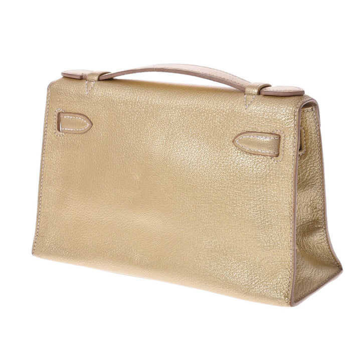Top quality Hermes Pochette Kelly Metallic Gold  I Engraved (around 2005) Ladies Goat Chevre Handbag
