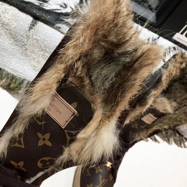 SE744   Size 4-12   Material: Cowhide  Lining: Rabbit Fur Sole: Rubber