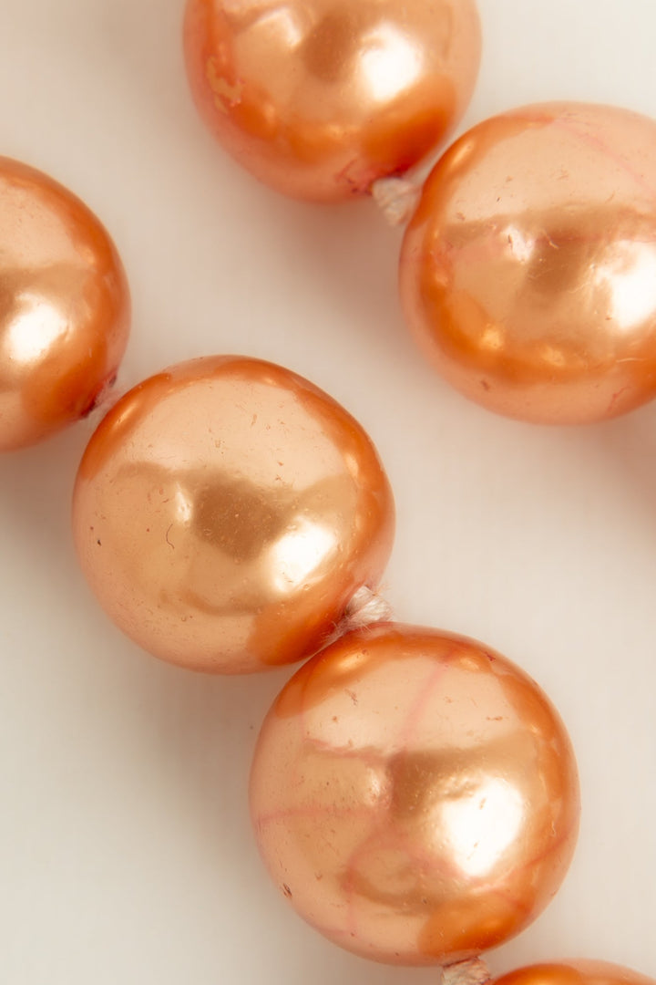 Collier de perles oranges Chanel