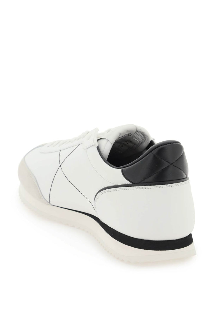 VALENTINO GARAVANI LOW TOP STUD AROUND SNEAKERS