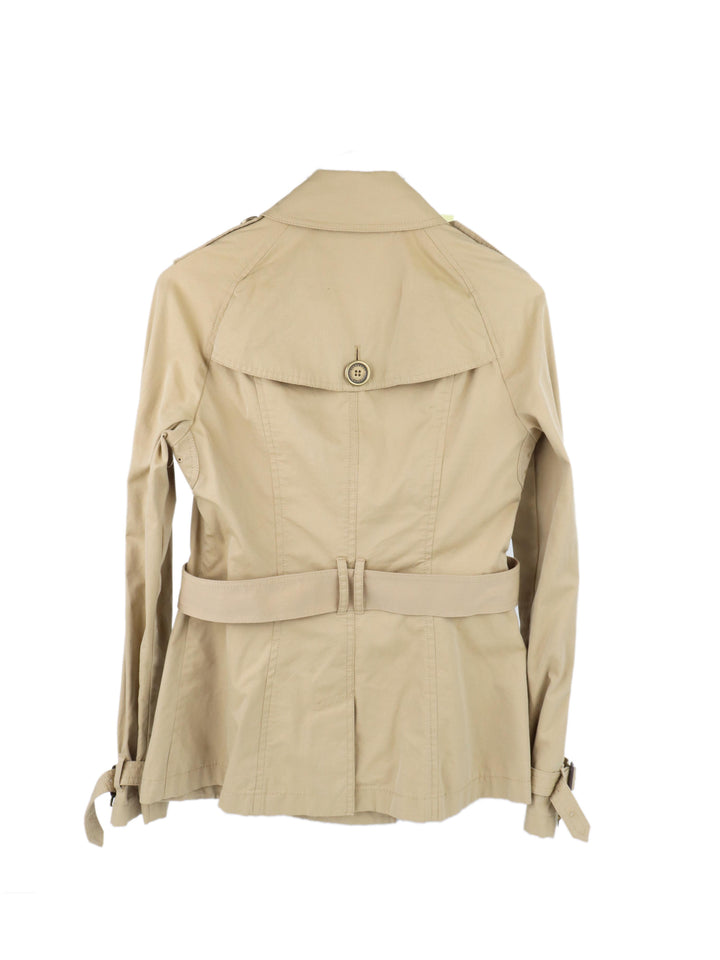 Burberry Short Tan Trench Coat.
