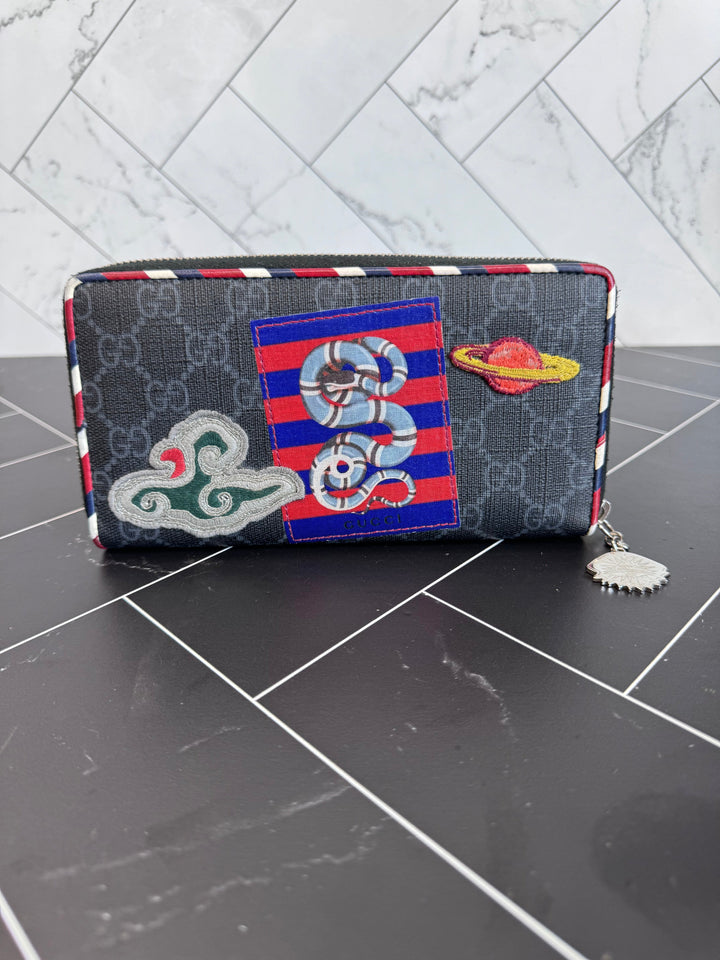Gucci Canvas Courier Zippy Wallet