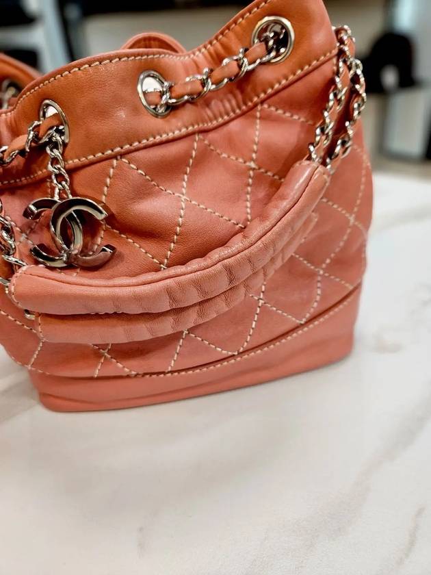 Drawstring lambskin coral silver bucket bag 10th L85469 Chanel