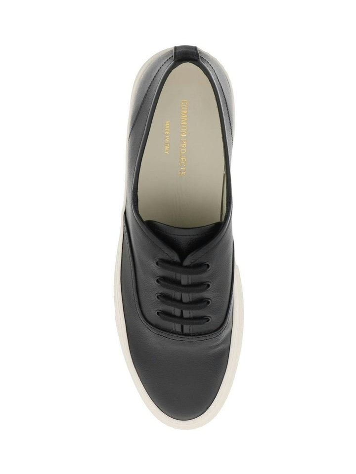 FOUR HOLE SUEDE SNEAKERS