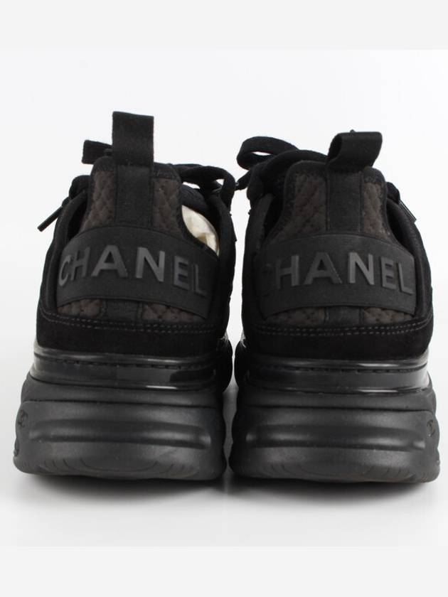 Mixed fiber black quilted gold sneakers 39 260 Chanel