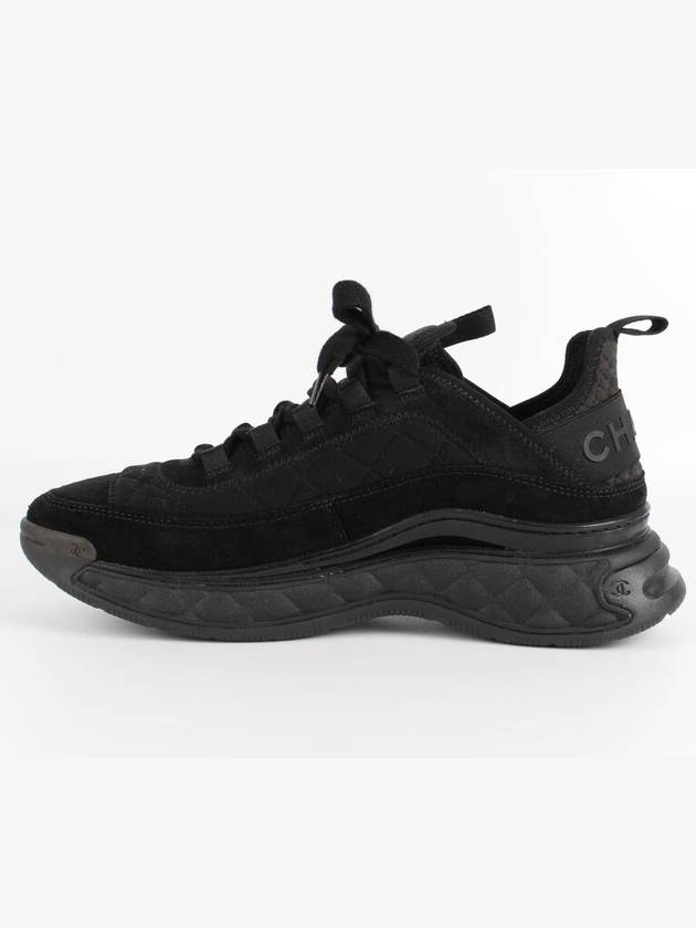 Mixed fiber black quilted gold sneakers 39 260 Chanel