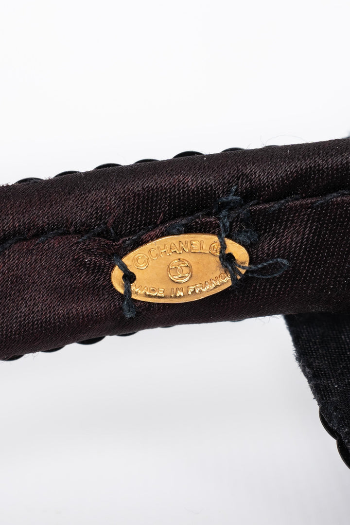 Serre-t√™te cam√©lia Chanel