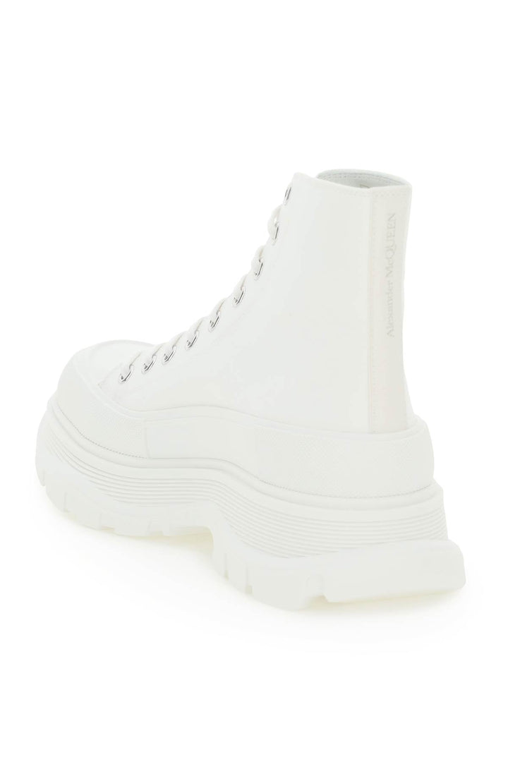 TREAD SLEEK HIGH-TOP SNEKAERS