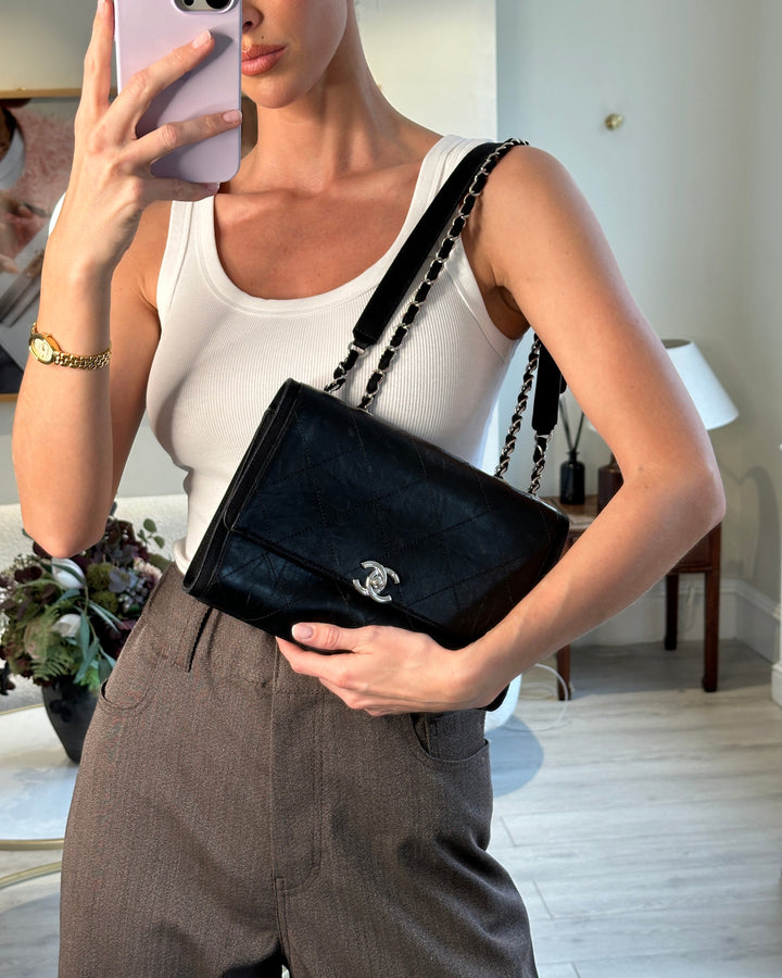 Top Quality Chanel Black Matelasse Crumpled Calfskin Leather Flap Bag With Silver Hardware and Grosgrain Fabric Detailing