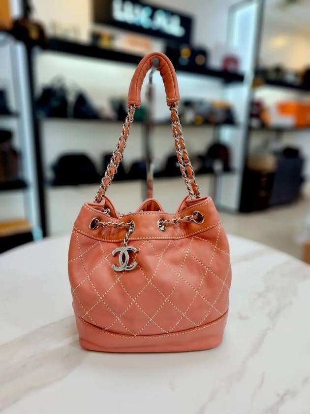 Drawstring lambskin coral silver bucket bag 10th L85469 Chanel