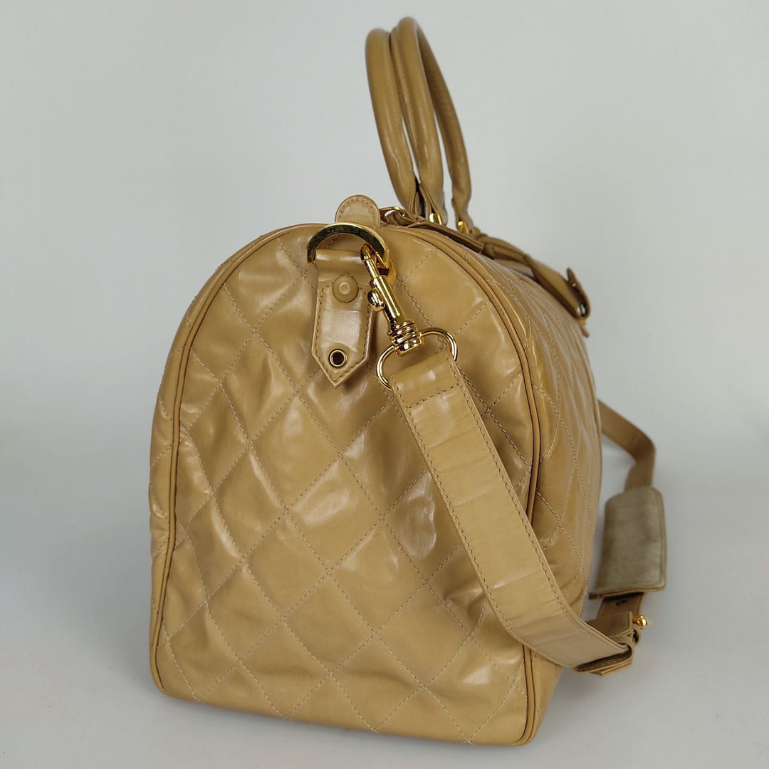 Top Quality Chanel Top Quality Chanel Top Quality Chanel quilted travel bag in beige patent leather