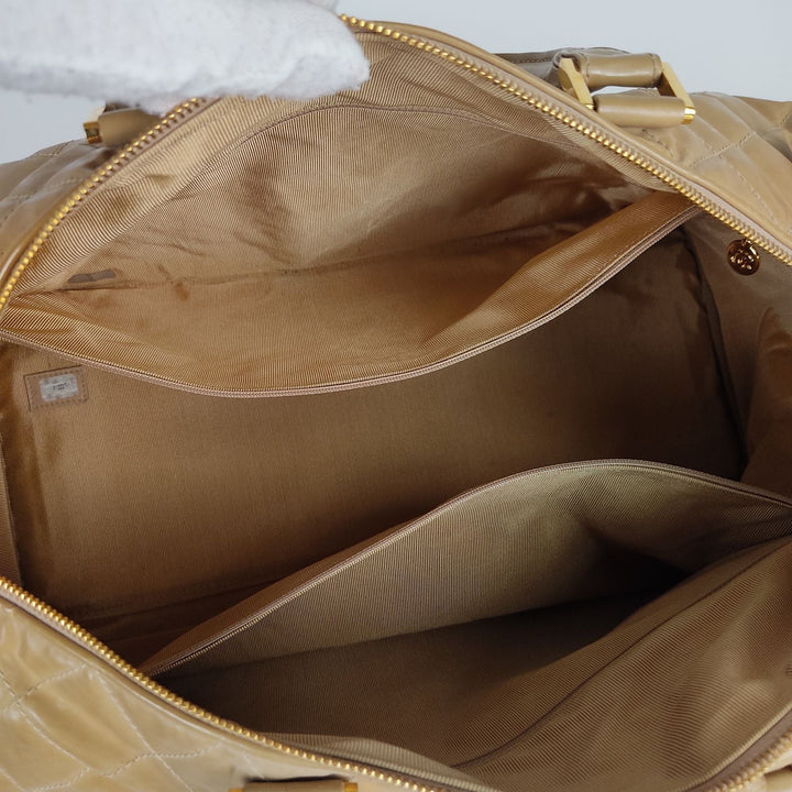 Top Quality Chanel Top Quality Chanel Top Quality Chanel quilted travel bag in beige patent leather