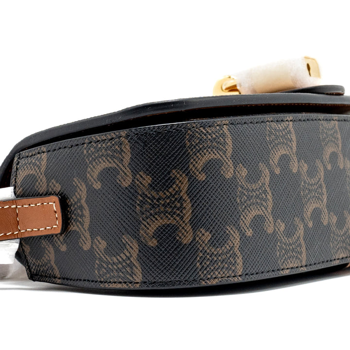 Celine Clutch on Strap Tabou in Triomphe canvas / calfskin tan