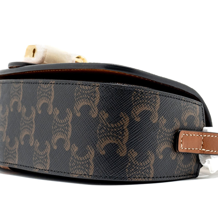 Celine Clutch on Strap Tabou in Triomphe canvas / calfskin tan