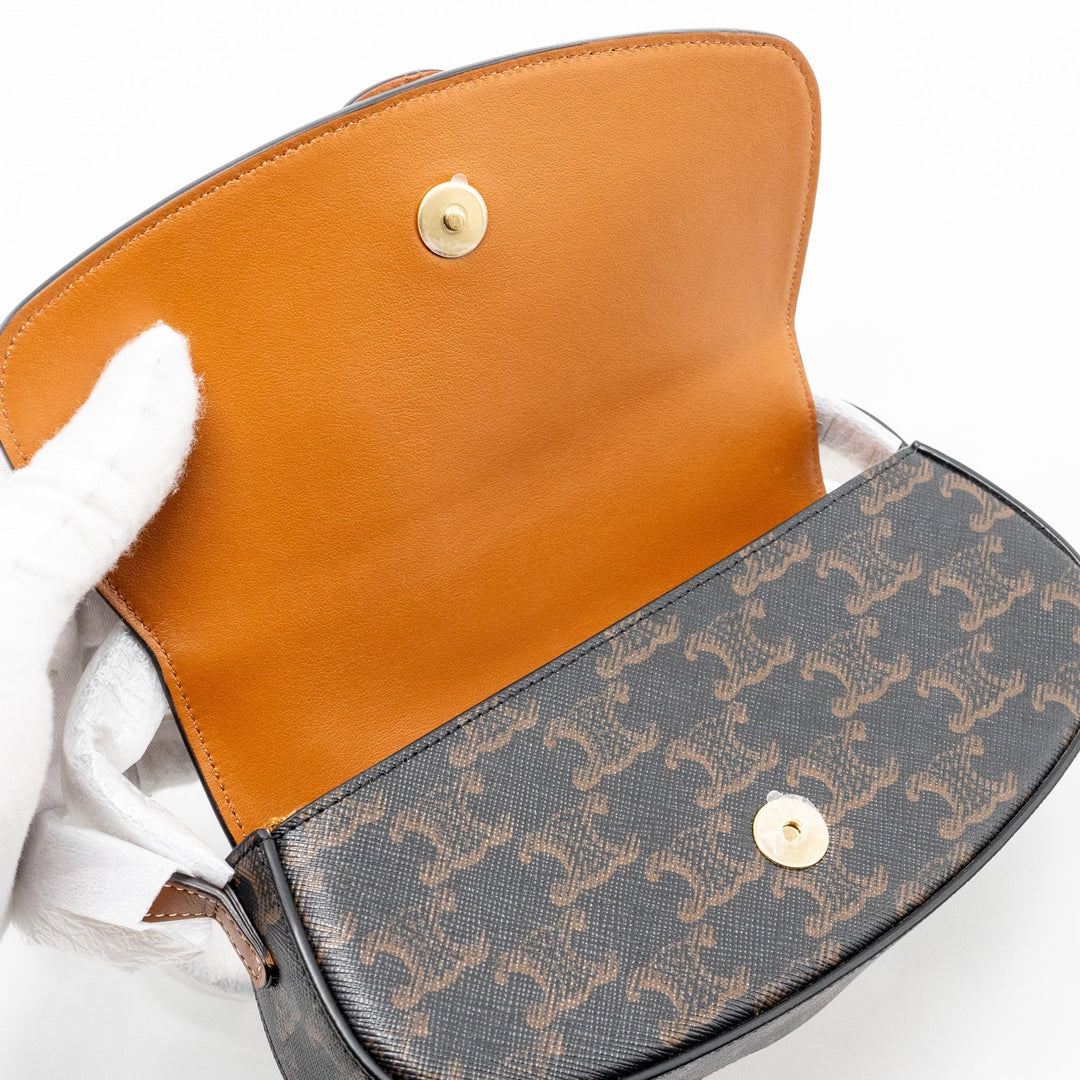 Celine Clutch on Strap Tabou in Triomphe canvas / calfskin tan