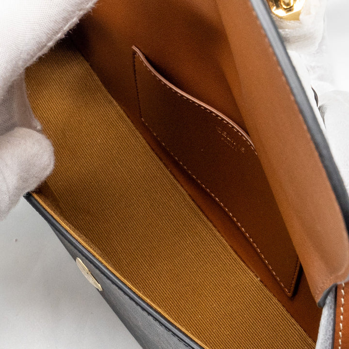 Celine Clutch on Strap Tabou in Triomphe canvas / calfskin tan