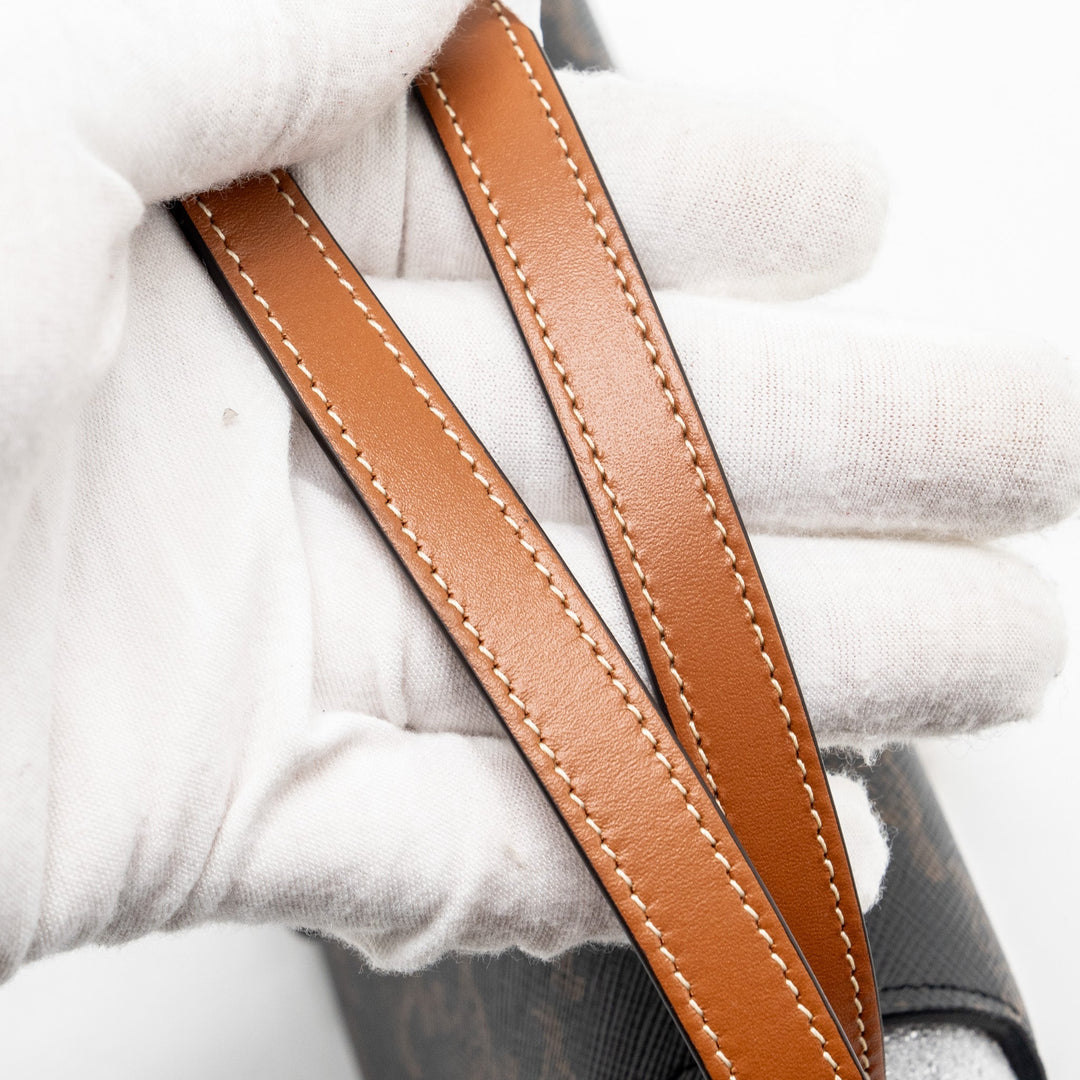 Celine Clutch on Strap Tabou in Triomphe canvas / calfskin tan