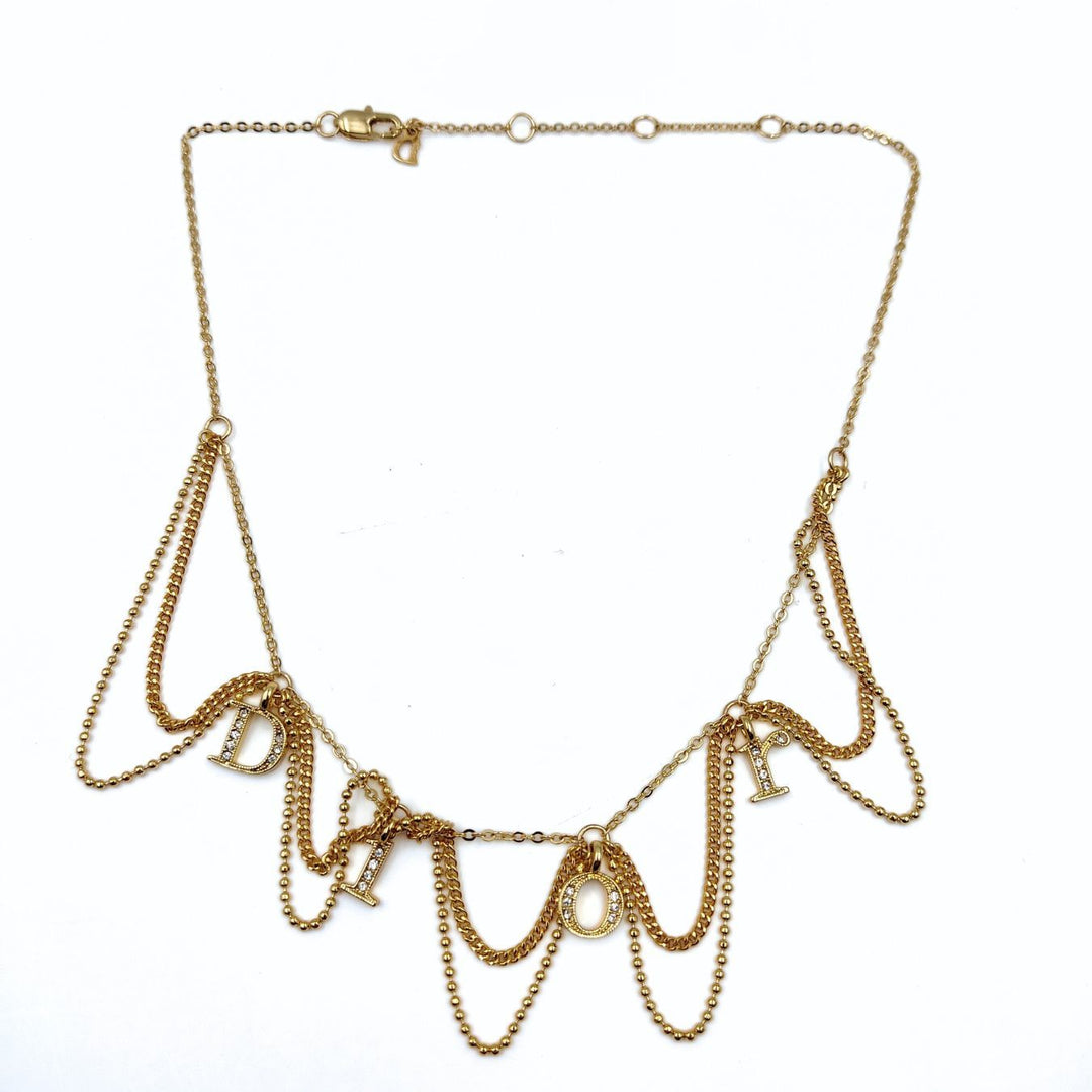 Top quality Dior women's necklace in golden metal and rhinestones