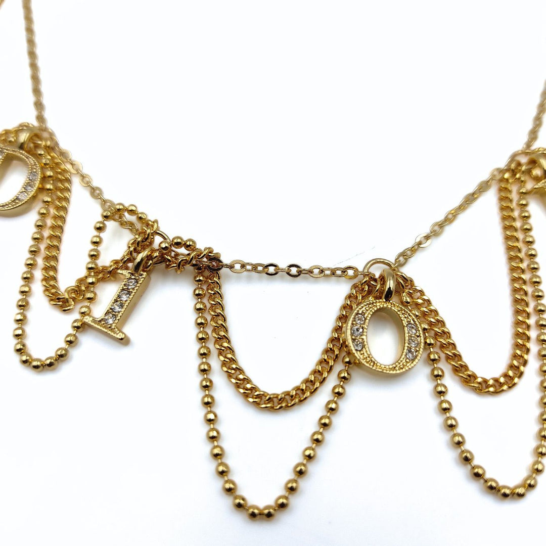 Top quality Dior women's necklace in golden metal and rhinestones