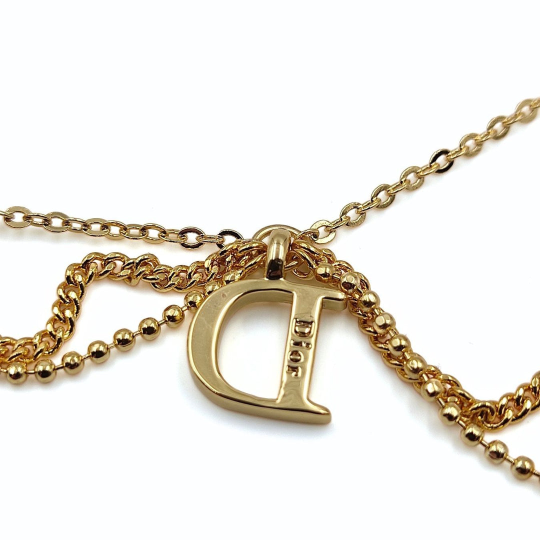 Top quality Dior women's necklace in golden metal and rhinestones