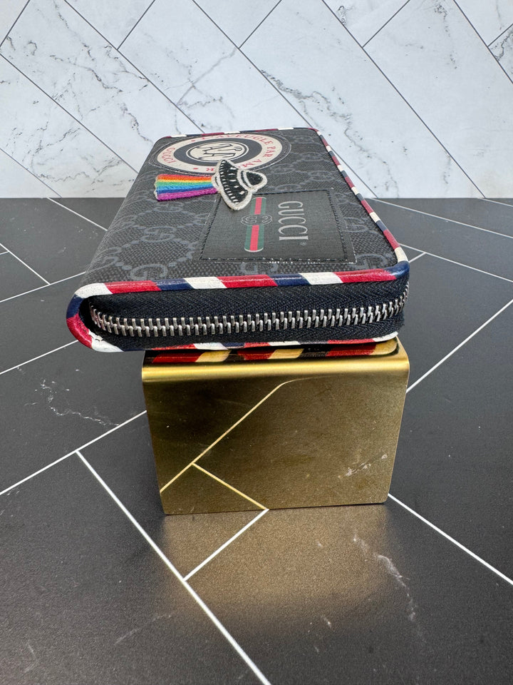 Gucci Canvas Courier Zippy Wallet