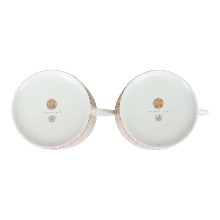 Hermes "Mosaique Au 24" Gold Porcelain Tea Cup And Saucer Set
