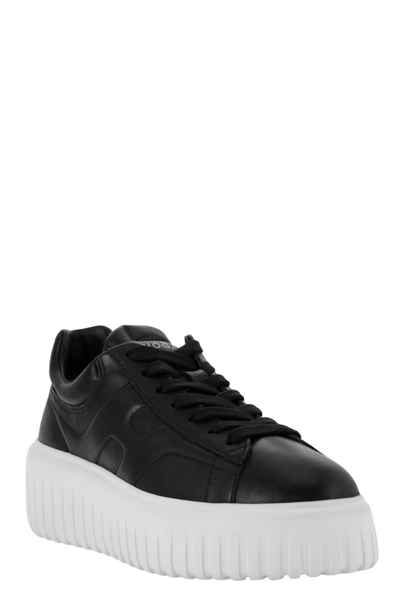 PLATFORM EMBOSSED LOGO SNEAKERS