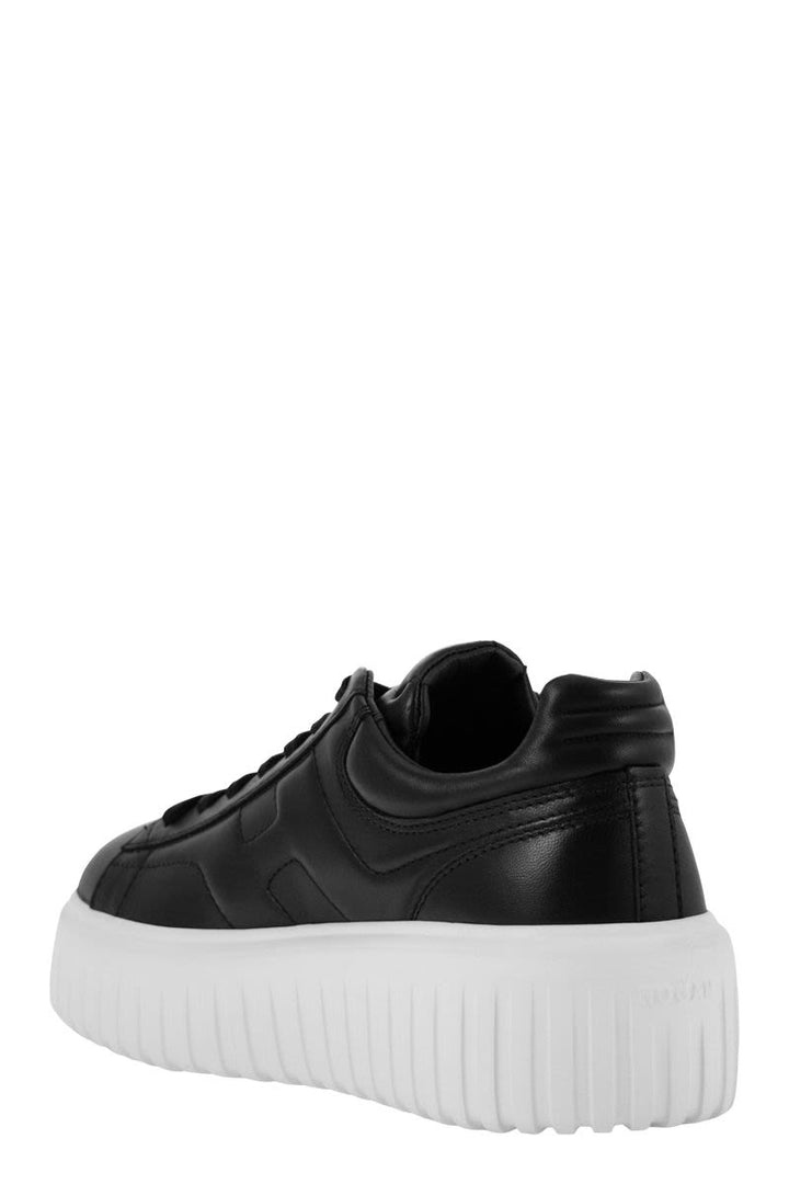 PLATFORM EMBOSSED LOGO SNEAKERS