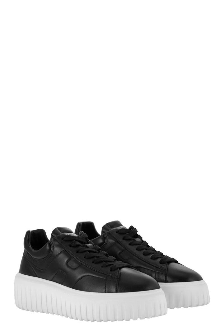 PLATFORM EMBOSSED LOGO SNEAKERS