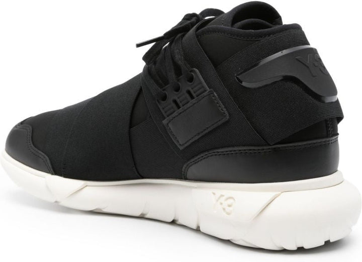QASA MID TOP SNEAKERS