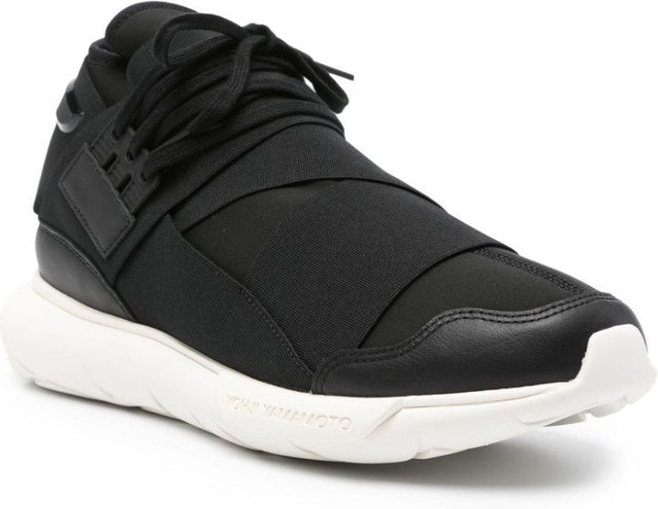 QASA MID TOP SNEAKERS