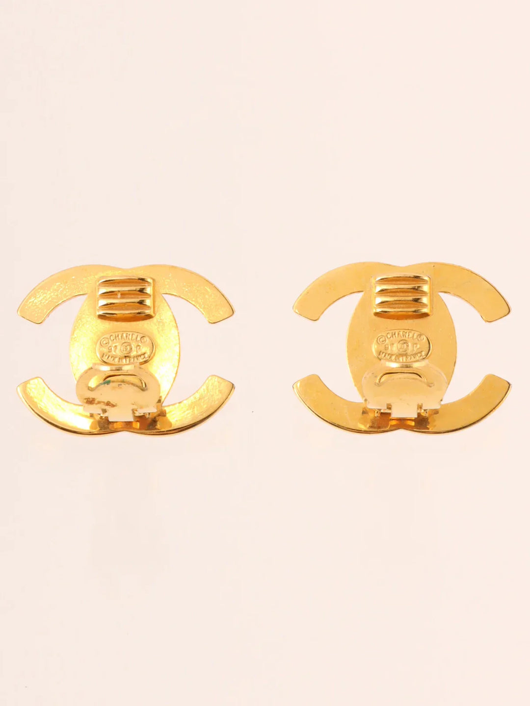 Chanel 1997 Made Rhinestone Turn-Lock Earrings Gold