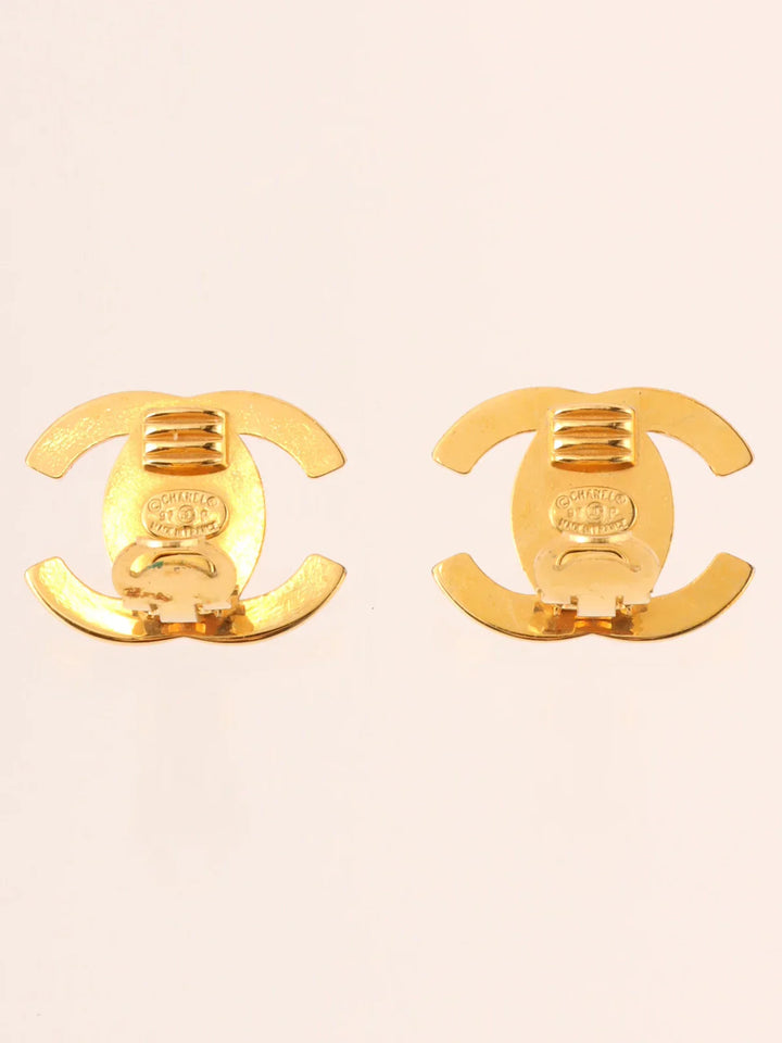 Chanel 1997 Made Rhinestone Turn-Lock Earrings Gold