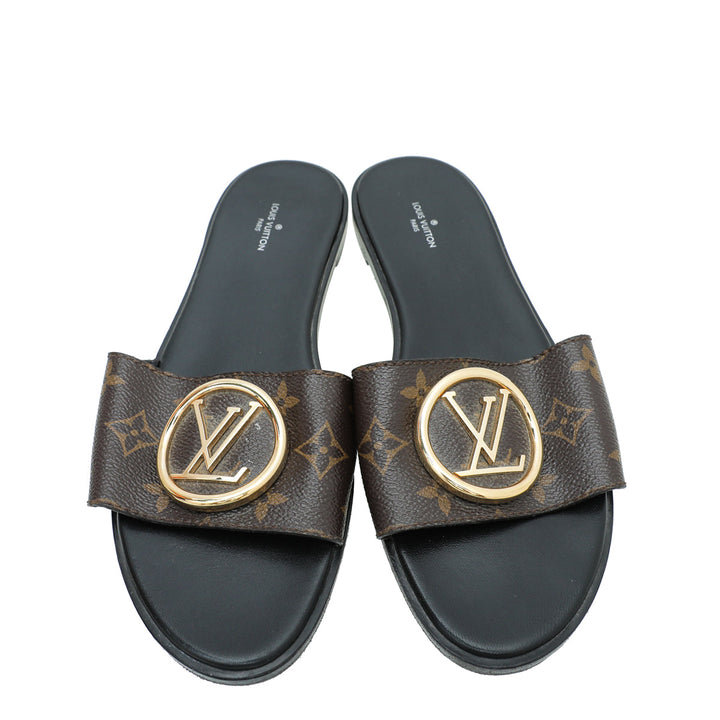 Louis Vuitton Monogram Lock It Flat Mules 41