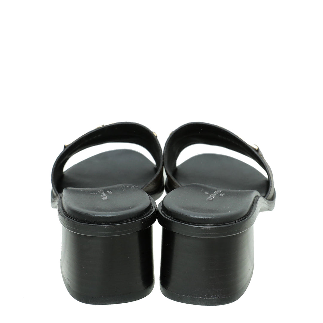 Louis Vuitton Monogram Lock It Mules 37.5