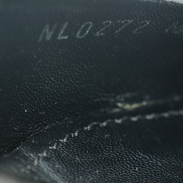 Louis Vuitton Black Rotary Mule 37