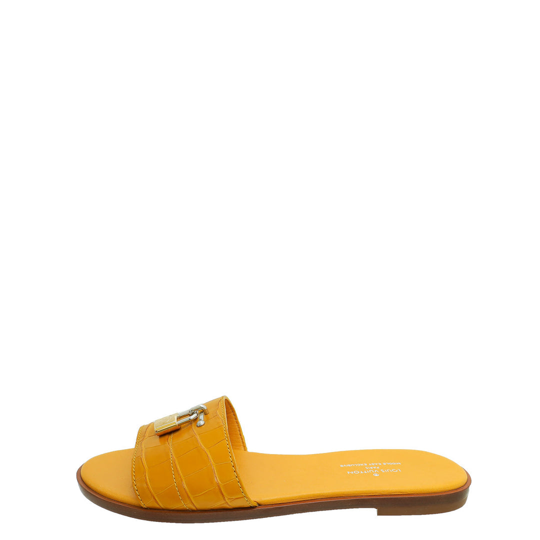 Louis Vuitton Yellow Crocodile Lock It Flat Mules 37