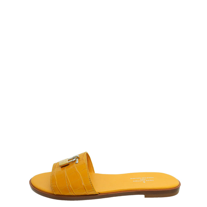 Louis Vuitton Yellow Crocodile Lock It Flat Mules 37